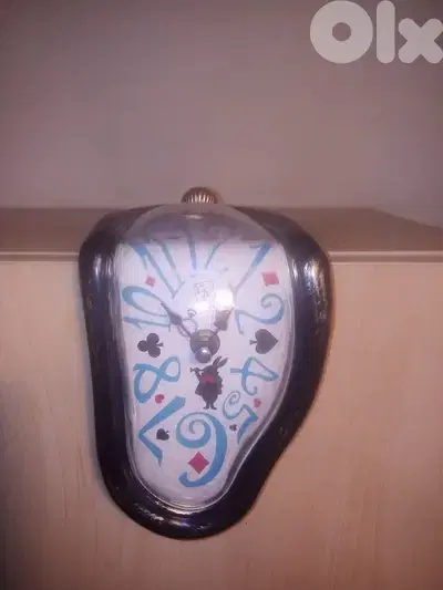 Melting clock inspired by the art of Salvador Dali. decorative clock