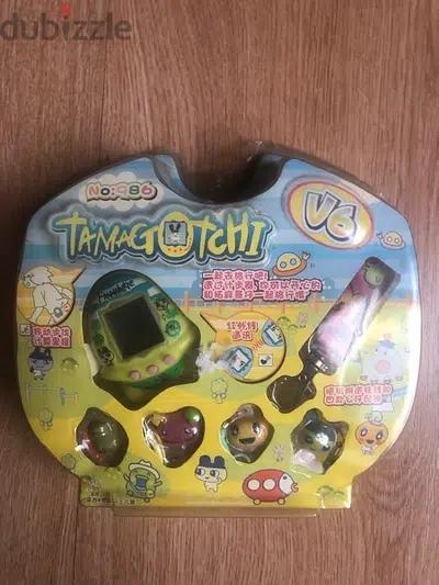 vintage rare 90 Japanese v6 TAMAGOTCHI pet to feed and grow تاماغوتشي