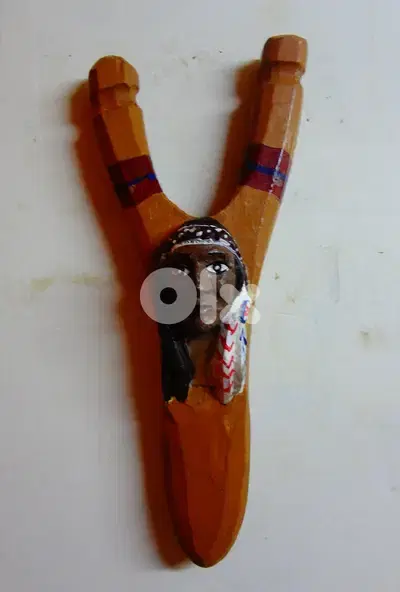 Red indian style wooden carved slingshot