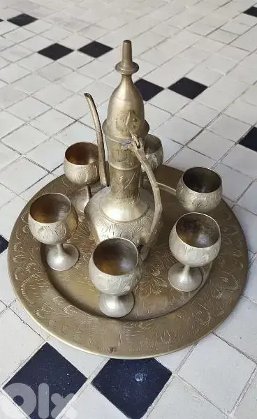 Antique 8 piece Brass Set finely tooled and etched. (Revised Price)