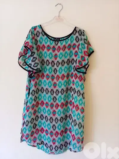 Dresses and tops multiple colours and sizes