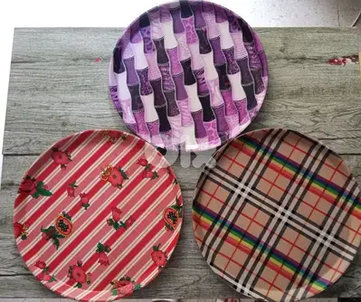 leather and wood trays