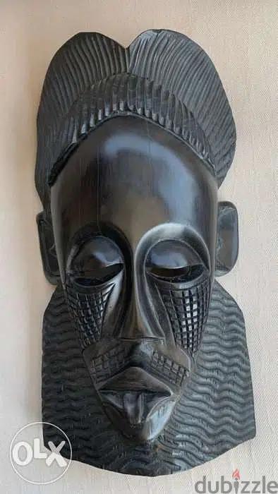 Ebony wood . handmade African mask