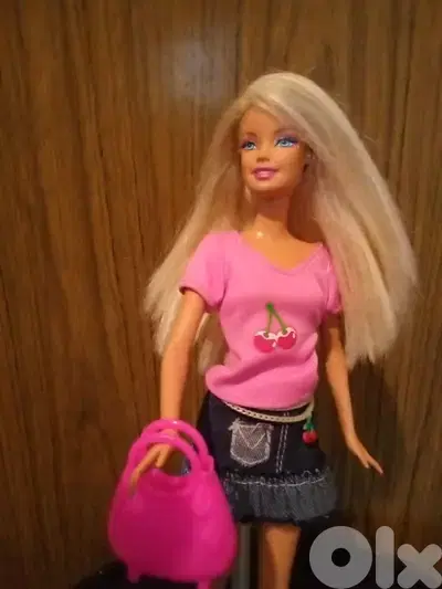 Barbie Mattel wearing As new doll bend legs+Shoes+Bag=25$