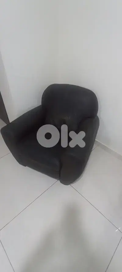 Dark brown leather armchair