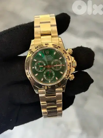 Rolex daytona gold
