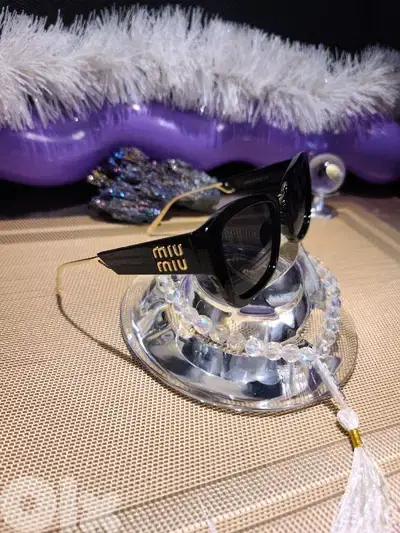 MIU MIU BLACK and GOLD luxury  sunglasses