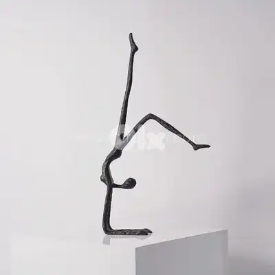 Stillness in Motion Sculpture – Abstract Black Metal Handstand Figure