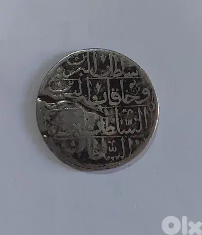 عملة عثمانية فضة للسلطان احمد الثالث  عام ١١١٥ هجري/١٧٠٤ م