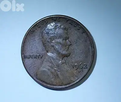Error USA  penny one cent 1962 D The error is letter "L"sticked to Rim