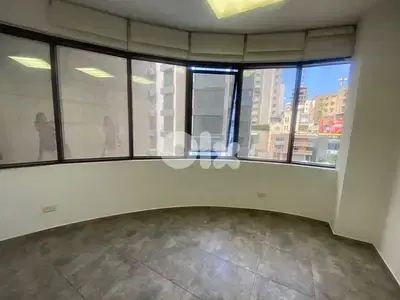 Minimalistic office with balcony and parking prime location achrafieh