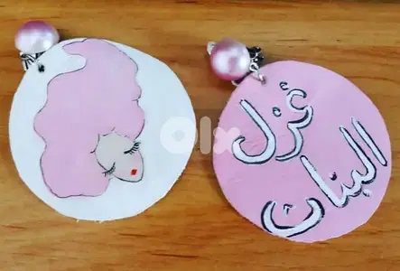 Hand painted ghazel al banat leather earrings.