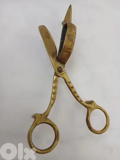 مقص مكبس