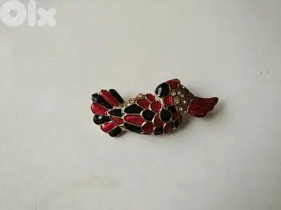 Old bird brooch - Not Negotiable