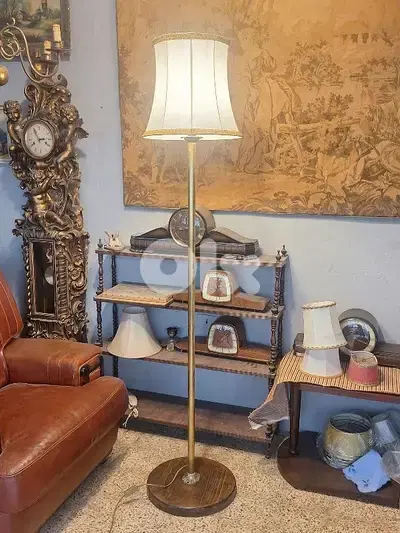 brass and wooden base floor lamp