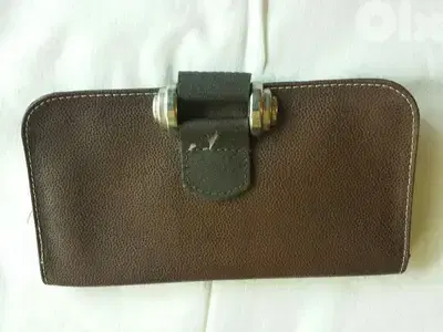 Elegant brown leather wallet - Not Negotiable