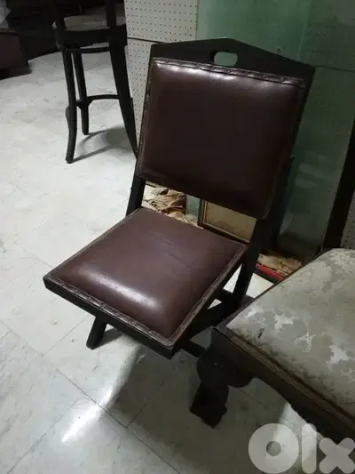 teak wood and authentic leather chair