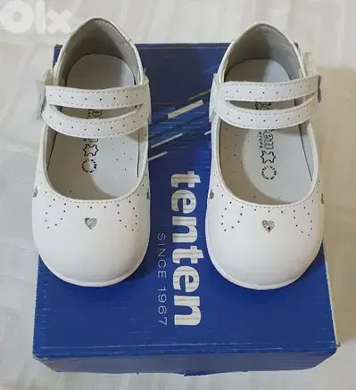 Baby shoes  white original leather  &  used  one  time  only  size  21