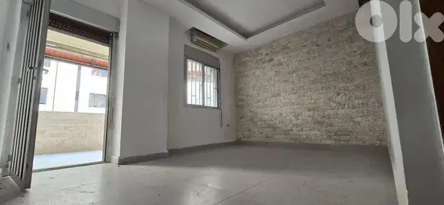 Apartment For Sale in Ballouneh - شقة للبيع في بلونة