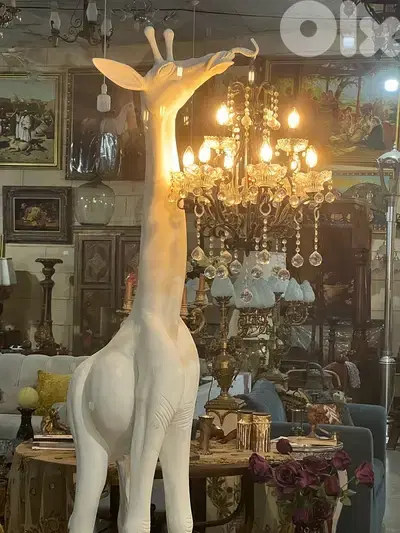 vintage white giraffe lighting holder