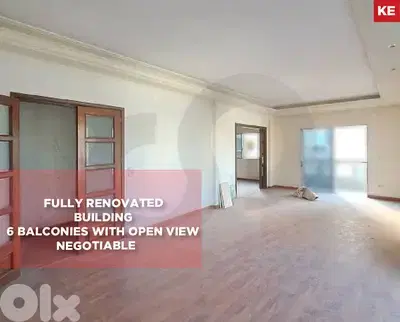fully renovated building,6 balconies -open view- Badaro REF#KE126948
