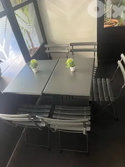 3xoutdoor steel tables and 7xchairs