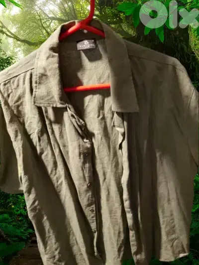 green T-shirt.