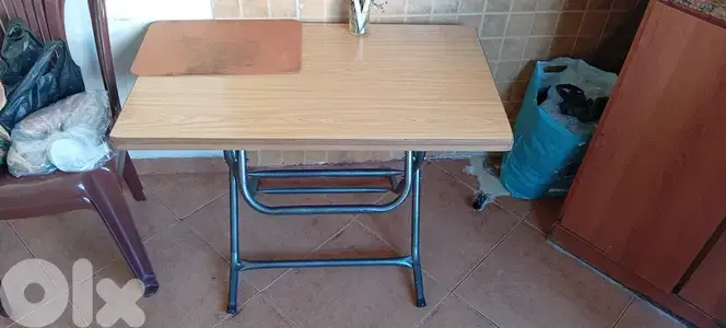 T. V 43"smart  . table 4 chairs   تلفزيون ٤٣ انش سمارت . طاولة ٤ كراسي