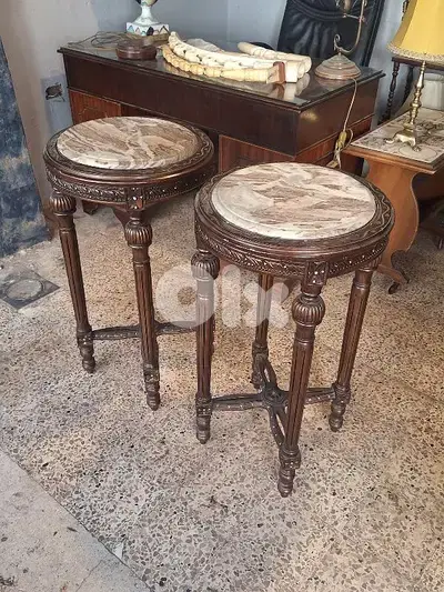 2 antique tall round solid wood and marble tables