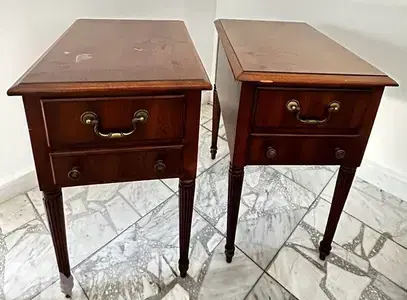 2 wooden coffee tables with drawers.