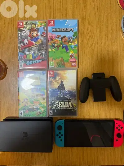 Nintendo Switch OLED (4 Games+ All Accessories)