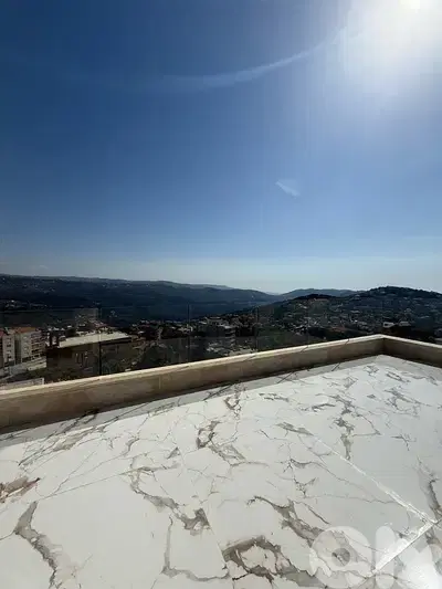 High end rooftop apartment for sale in Baabdat W/ open mountain views