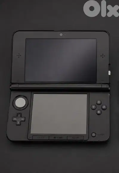nintendo 3ds xl with games and sd cards