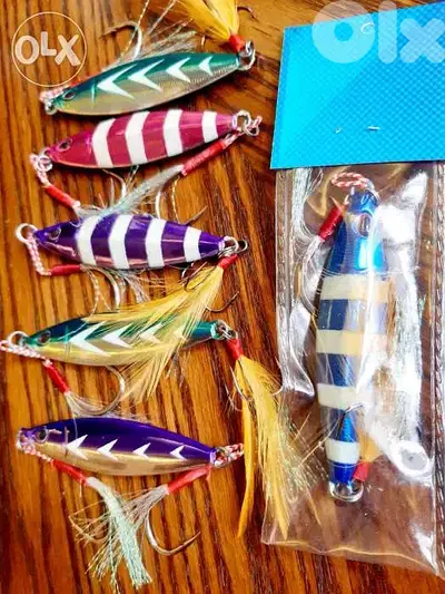 4 sale or trade on jig rod or reel glow jigs 80 gram