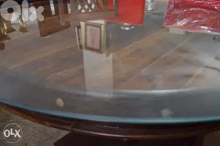 round solid wood teak table with 4 chairs
