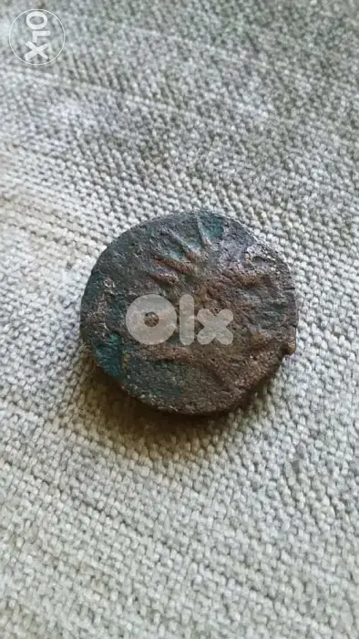 Greek Bronze Coin of Cleopetra Thea reign of Antiochus year 123 BC