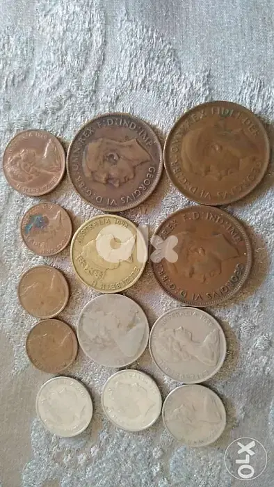 Set of 13 old Austrailian Coinsمجموعة من ١٣ عملة اوسترالية قديمة