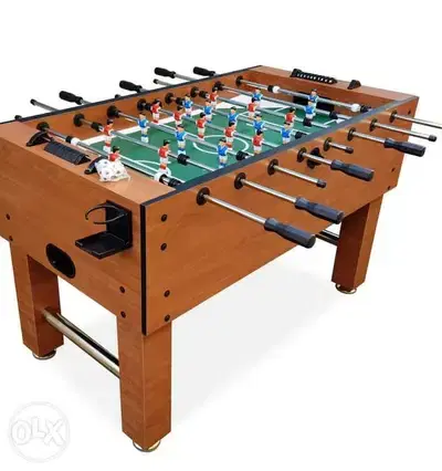 brown wood soccer table