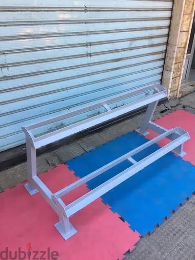 dumbells rack like new we have also all sports equipment 70/443573