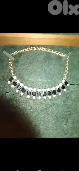 spikes necklace gold tone with black stones
