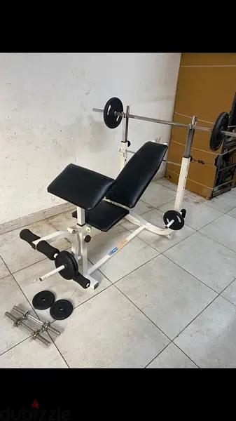 bench adjustable with adjustable rack with legs extension like new