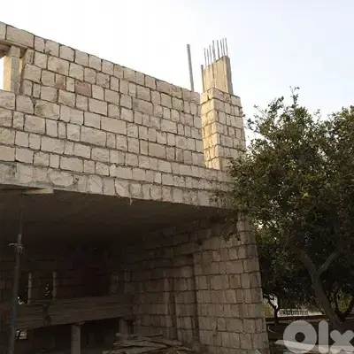 بناء حجر صخري لال حداق