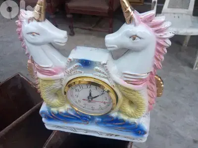 ساعة بورسلين عبطارية