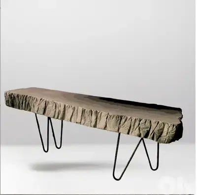 Concrete table rocky style with rebar steel legs, in and outdoor use
