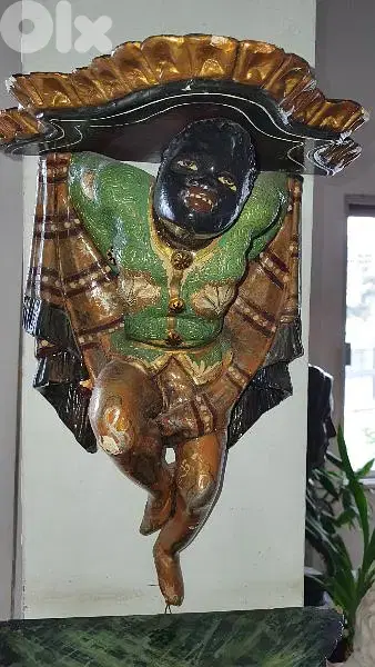 Aplique naîgre  en bois sculpté
